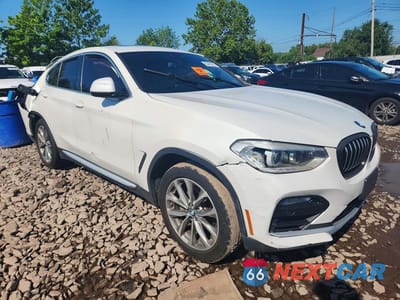 Czwarte zdjęcie samochodu z boku: 2019 BMW X4 XDRIVE30I VIN:5UXUJ3C53KLG53660 - miniatura