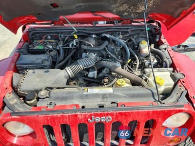 Zdjęcie 12 z 14 samochodu: 2010 JEEP WRANGLER SAHARA VIN:1J4AA5D14AL162290 - miniatura