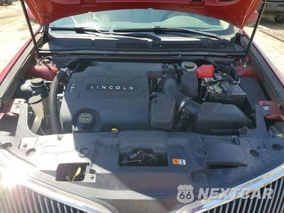 Zdjęcie 11 z 12 samochodu: 2015 LINCOLN MKS VIN:1LNHL9DK8FG606622 - miniatura