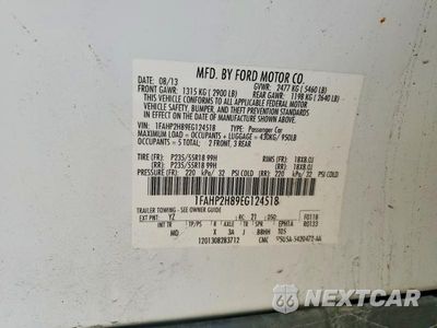 Zdjęcie 12 z 12 samochodu: 2014 FORD TAURUS SEL VIN:1FAHP2H89EG124518 - miniatura