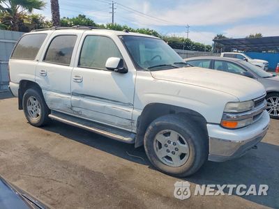 Czwarte zdjęcie samochodu z boku: 2004 CHEVROLET TAHOE K1500 VIN:1GNEK13Z74J261584 - miniatura
