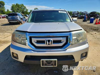 Piąte zdjęcie samochodu w środku: 2011 HONDA PILOT EX VIN:5FNYF4H44BB064370 - miniatura