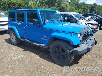 Czwarte zdjęcie samochodu z boku: 2011 JEEP WRANGLER UNLIMITED SAHARA VIN:1J4BA5H17BL641416 - miniatura