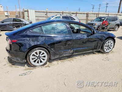 Trzecie zdjęcie samochodu z tyłu: 2022 TESLA MODEL 3 VIN:5YJ3E1EA4NF369667 - miniatura