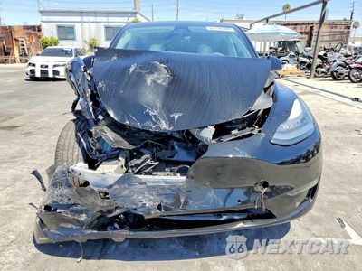 Piąte zdjęcie samochodu w środku: 2022 TESLA MODEL Y VIN:7SAYGDEE5NF433898 - miniatura