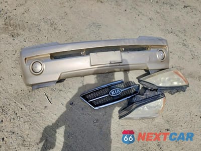 Zdjęcie 13 z 14 samochodu: 2003 KIA SORENTO LX VIN:KNDJD733835049719 - miniatura