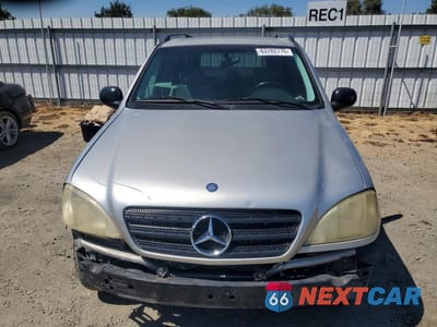 Piąte zdjęcie samochodu w środku: 1998 MERCEDES-BENZ ML 320 VIN:4JGAB54E8WA037507 - miniatura
