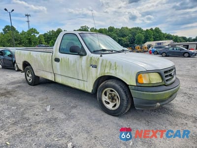 Czwarte zdjęcie samochodu z boku: 2002 FORD F150 VIN:1FTRF17292NC01016 - miniatura