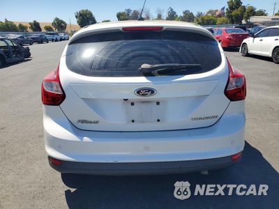 Zdjęcie 6 z 12 samochodu: 2014 FORD FOCUS TITANIUM VIN:1FADP3N28EL176623 - miniatura