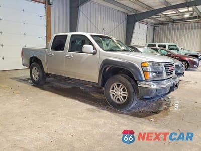 Czwarte zdjęcie samochodu z boku: 2011 GMC CANYON SLE VIN:1GTH6MFE3B8128636 - miniatura