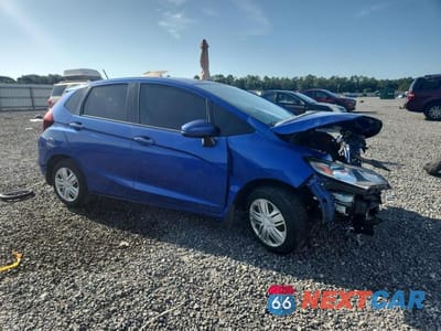 Czwarte zdjęcie samochodu z boku: 2018 HONDA FIT LX VIN:3HGGK5H49JM702301 - miniatura