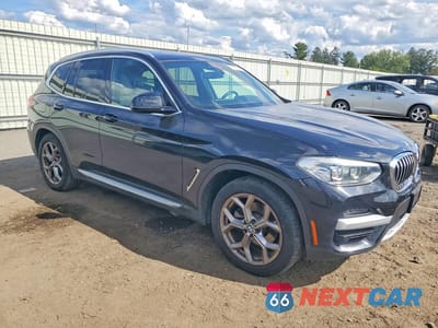 Czwarte zdjęcie samochodu z boku: 2021 BMW X3 XDRIVE30E VIN:5UXTS1C00M9F45143 - miniatura