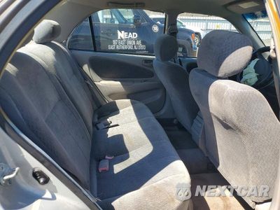 Zdjęcie 10 z 12 samochodu: 2001 TOYOTA COROLLA LE VIN:2T1BR12E61C391546 - miniatura