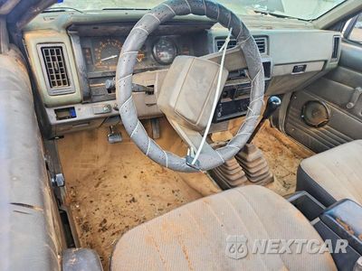 Zdjęcie 8 z 11 samochodu: 1989 NISSAN TRUCK BASE VIN:1N6ND11Y7KC349112 - miniatura
