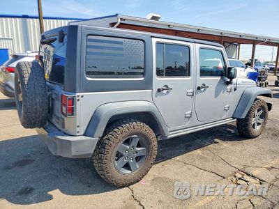 Trzecie zdjęcie samochodu z tyłu: 2016 JEEP WRANGLER UNLIMITED SPORT VIN:1C4BJWDG1GL114078 - miniatura