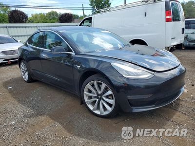 Czwarte zdjęcie samochodu z boku: 2018 TESLA MODEL 3 VIN:5YJ3E1EA3JF169907 - miniatura