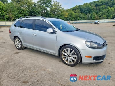 Czwarte zdjęcie samochodu z boku: 2012 VOLKSWAGEN JETTA TDI VIN:3VWPL7AJ2CM674865 - miniatura