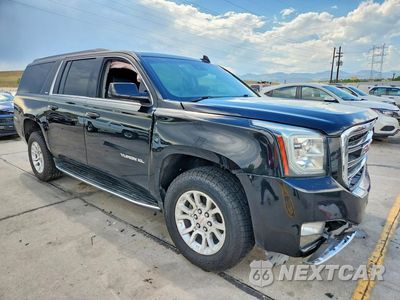 Czwarte zdjęcie samochodu z boku: 2019 GMC YUKON XL K1500 SLT VIN:1GKS2GKC1KR107774 - miniatura
