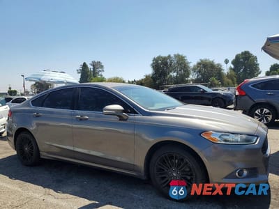Czwarte zdjęcie samochodu z boku: 2014 FORD FUSION SE VIN:3FA6P0HD6ER194897 - miniatura