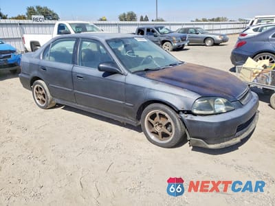 Czwarte zdjęcie samochodu z boku: 1998 HONDA CIVIC LX VIN:JHMEJ6678WS015061 - miniatura