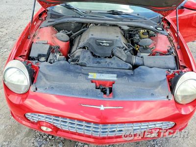 Zdjęcie 11 z 12 samochodu: 2004 FORD THUNDERBIRD VIN:1FAHP60AX4Y110237 - miniatura