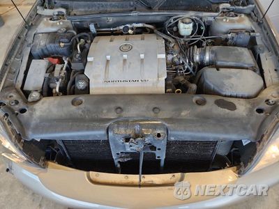 Zdjęcie 11 z 12 samochodu: 2004 CADILLAC DEVILLE VIN:1G6KD54Y04U244128 - miniatura