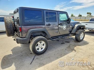 Trzecie zdjęcie samochodu z tyłu: 2014 JEEP WRANGLER UNLIMITED SPORT VIN:1C4HJWDG7EL246866 - miniatura