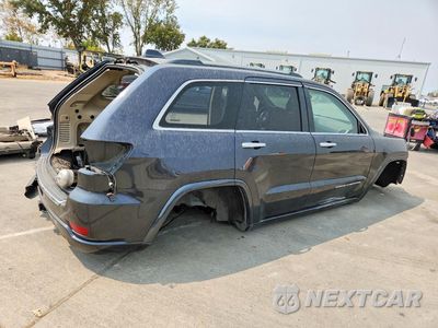 Trzecie zdjęcie samochodu z tyłu: 2014 JEEP GRAND CHEROKEE OVERLAND VIN:1C4RJFCG4EC448831 - miniatura