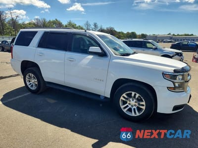 Czwarte zdjęcie samochodu z boku: 2015 CHEVROLET TAHOE K1500 LT VIN:1GNSKBKC2FR117693 - miniatura