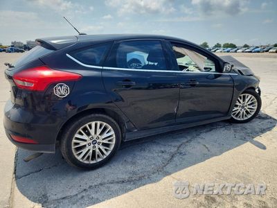 Trzecie zdjęcie samochodu z tyłu: 2017 FORD FOCUS TITANIUM VIN:1FADP3N29HL272524 - miniatura