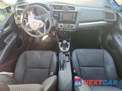 Zdjęcie 8 z 12 samochodu: 2018 HONDA FIT LX VIN:3HGGK5H49JM702301 - miniatura