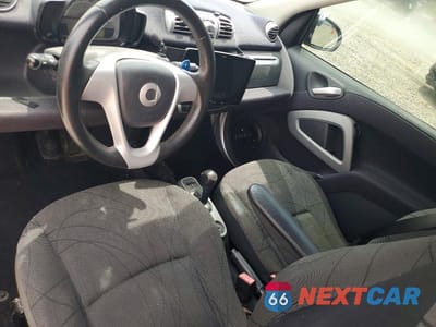 Zdjęcie 8 z 12 samochodu: 2013 SMART FORTWO PURE VIN:WMEEJ3BA2DK688749 - miniatura