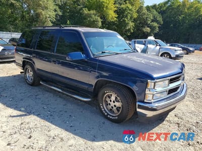 Czwarte zdjęcie samochodu z boku: 1995 CHEVROLET TAHOE C1500 VIN:1GNEC13K0SJ439140 - miniatura