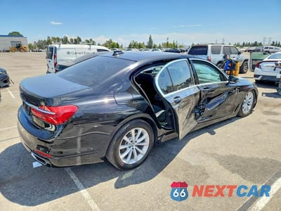Trzecie zdjęcie samochodu z tyłu: 2019 BMW 740 I VIN:WBA7E2C52KB216777 - miniatura