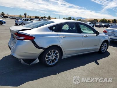 Trzecie zdjęcie samochodu z tyłu: 2017 FORD FUSION SE HYBRID VIN:3FA6P0LU8HR356945 - miniatura