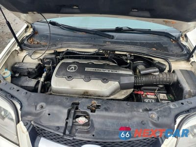 Zdjęcie 12 z 13 samochodu: 2006 ACURA MDX TOURING VIN:2HNYD18906H541645 - miniatura