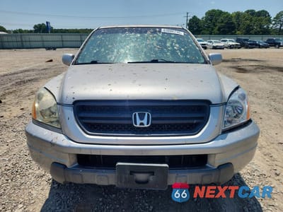 Piąte zdjęcie samochodu w środku: 2005 HONDA PILOT EX VIN:2HKYF18435H003760 - miniatura