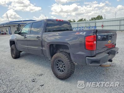 Trzecie zdjęcie samochodu z tyłu: 2016 CHEVROLET SILVERADO K1500 LT VIN:3GCUKREC2GG234388 - miniatura