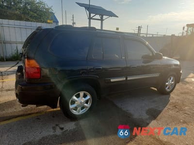 Trzecie zdjęcie samochodu z tyłu: 2004 GMC ENVOY VIN:1GKDT13S642342398 - miniatura