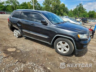 Czwarte zdjęcie samochodu z boku: 2012 JEEP GRAND CHEROKEE LAREDO VIN:1C4RJFAG8CC226731 - miniatura
