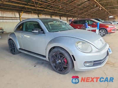 Czwarte zdjęcie samochodu z boku: 2012 VOLKSWAGEN BEETLE TURBO VIN:3VWVA7AT8CM614359 - miniatura