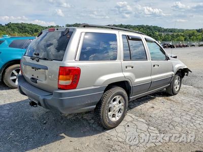 Trzecie zdjęcie samochodu z tyłu: 2000 JEEP GRAND CHEROKEE LAREDO VIN:1J4GW48SXYC322692 - miniatura