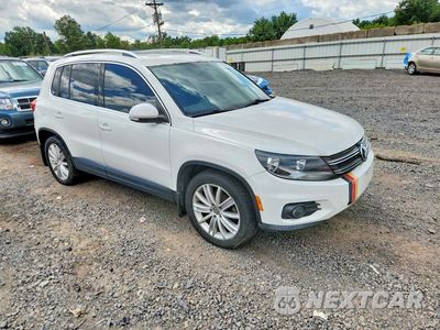 Czwarte zdjęcie samochodu z boku: 2013 VOLKSWAGEN TIGUAN S VIN:WVGBV7AX8DW545165 - miniatura