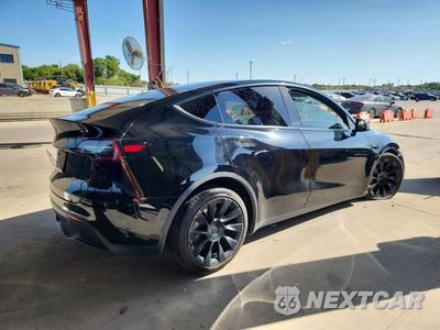 Trzecie zdjęcie samochodu z tyłu: 2021 TESLA MODEL Y VIN:5YJYGDEE7MF245606 - miniatura