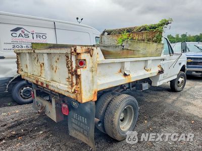 Trzecie zdjęcie samochodu z tyłu: 1997 FORD F350 SUPER DUTY DUMP TRUCK VIN:3FEKF38F3VMA60741 - miniatura