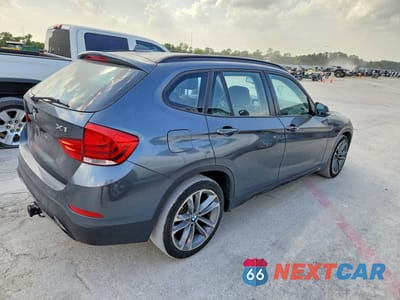 Trzecie zdjęcie samochodu z tyłu: 2014 BMW X1 XDRIVE28I VIN:WBAVL1C55EVY19023 - miniatura