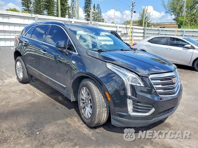 Czwarte zdjęcie samochodu z boku: 2019 CADILLAC XT5 VIN:1GYKNARS8KZ189851 - miniatura