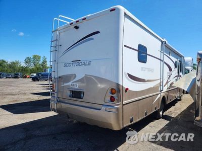 Czwarte zdjęcie samochodu z boku: 2004 FORD SCOTTSDALE RV VIN:1F6NF53S340A13302 - miniatura