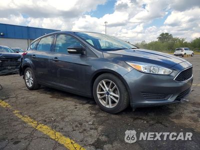 Czwarte zdjęcie samochodu z boku: 2018 FORD FOCUS SE VIN:1FADP3K23JL222163 - miniatura