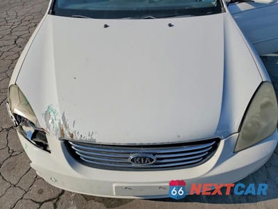 Zdjęcie 11 z 12 samochodu: 2006 KIA OPTIMA LX VIN:KNAGE124665022549 - miniatura